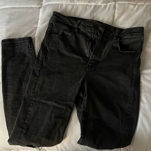 American Eagle high waisted skinny jeans with knee rips